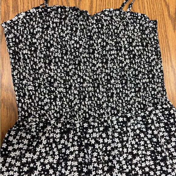 Floral Black and White Women's Jumpsuit with Flared Ruffled Legs - Picture 3 of 5